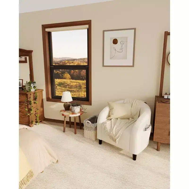 Poltrona a barilotto in tessuto bouclé nei colori nero/grigio scuro/bianco/giallo, con seduta singola