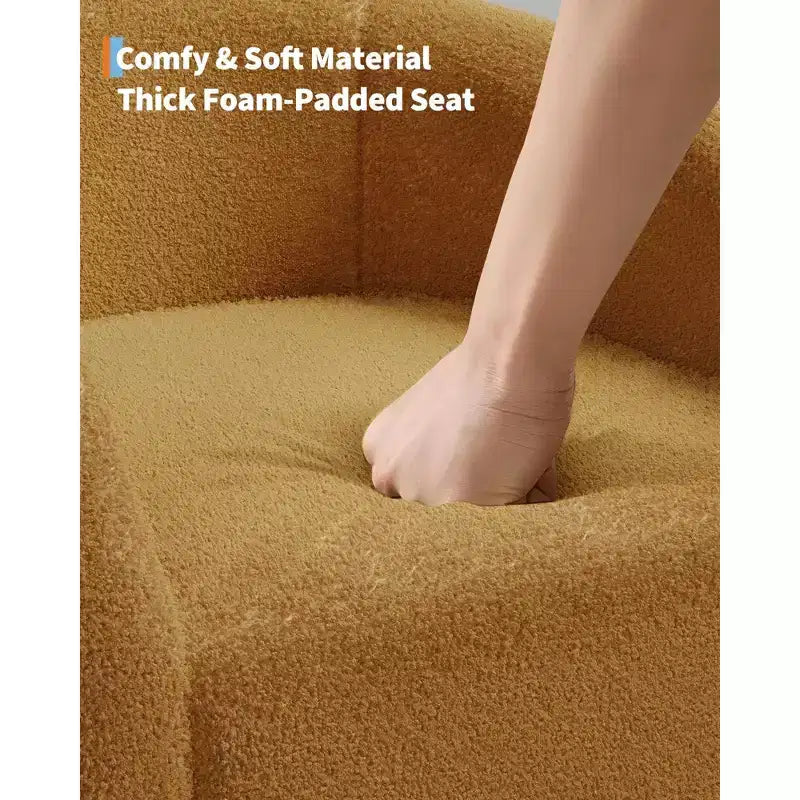 Poltrona a barilotto in tessuto bouclé nei colori nero/grigio scuro/bianco/giallo, con seduta singola